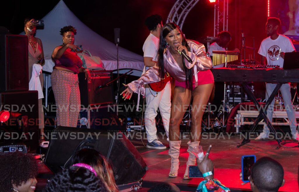 Soca diva Patrice Roberts belts out one of her hits during a high-energy performance at Utopia Weekend at Buccoo Heritage Park, Sunday.  - David Reid