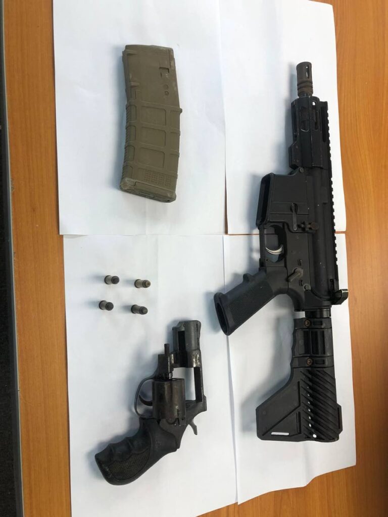 An AR 15 assault rifle and a .38 revolver were found and seized in two separate incidents in Morvant on Thursday morning. 

Photo courtesy TTPS