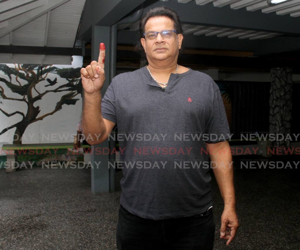 FORMER Barataria/San Juan MP Dr Fuad Khan voted in the United National Congress internal election on Sunday at the SWWTU Hall on Wrightson Road, Port of Spain. Khan contested post of political leader.  - AYANNA KINSALE