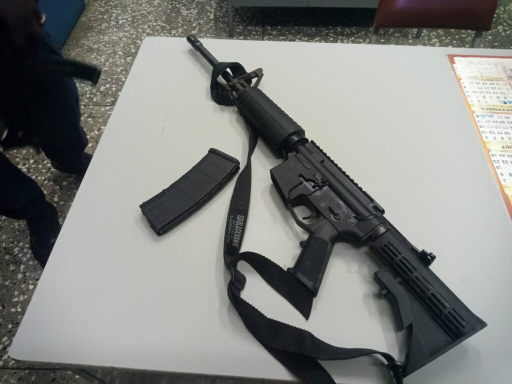 An AR 15 was found and seized by police in Carapo on Friday afternoon. 

PHOTO COURTESY TTPS - PHOTO COURTESY TTPS