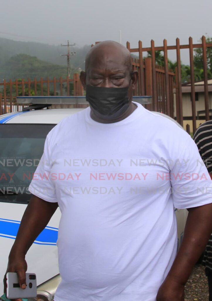 Denzel Matthew, father of murdered vendor Ako Matthew walks away from Forensics Science Centre in St James after receiving the DNA tests from the remains of his son, whose body was found off a precipice on North Coast Road , Maracas in April. - Photo by Sureash Cholai
