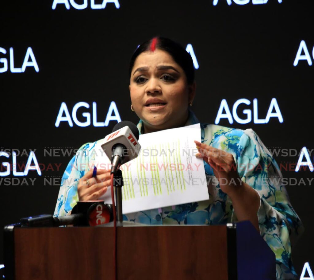 Minister in the Ministry of the Attorney General Senator  Renuka Sagramsingh-Sooklal displays legal advice received by her ministry from attorney Kerwin Garcia on the Piarco I case during a press conference at   Government Plaza, Port of Spain, Wednesday. Photo by Sureash Cholai