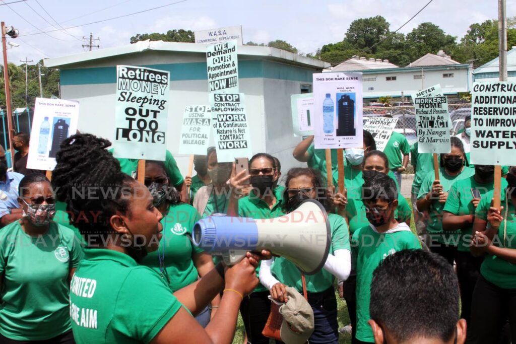 PSA first vice president Felisha Thomas speaks to protesting WASA employees about the possibility of 600 workers being retrenched at their Farm Road, St Joseph headquarters on Thursday. - Angelo Marcelle