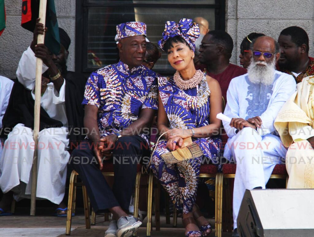 MY HERITAGE: Prime Minister Dr Keith Rowley seen here with wife Sharon during Emancipation Day celebrations in 2019, has defended his Kunta Kinte Facebook page posting saying history must never be forgotten. (File photo)