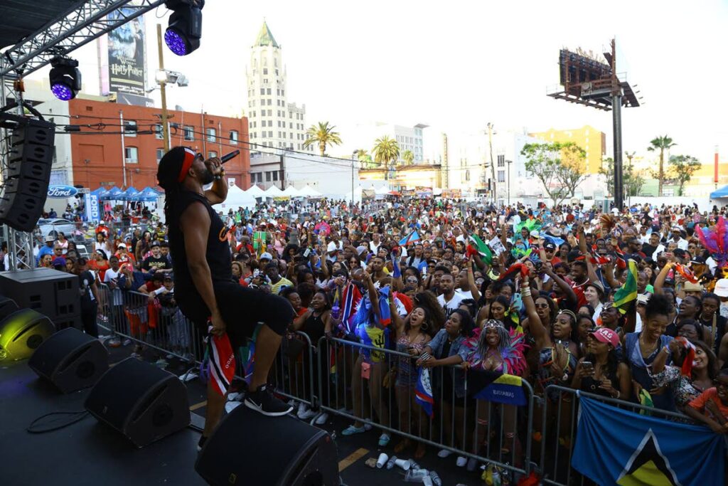 Machel Montano whips the crowd into a frenzy at the Los Angeles Canival Culture Village, downtown Hollywood, California in 2016. - 