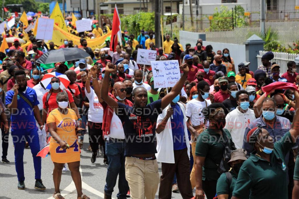 Members of several trade unions protest against a wage offer by the CPO during a march in Port of Spain in May. Does a trade union have the right to decide who should be a manager of an enterprise and can a union defend the rights of a manager at the Industrial Court? - SUREASH CHOLAI