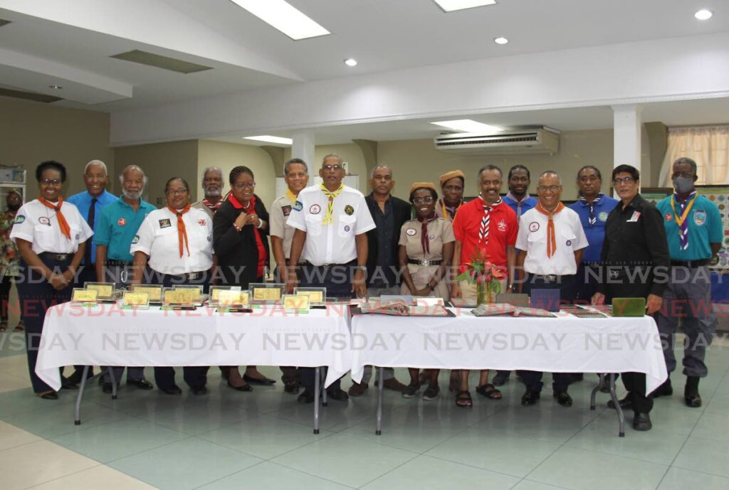 Lynley Lutchmedial is joined by the fellow scouts as they appreciated him for his 50 years of service to scouting at the San Fernando District Scout Headquaters, Embacadere on July 2.

 - Marvin Hamilton