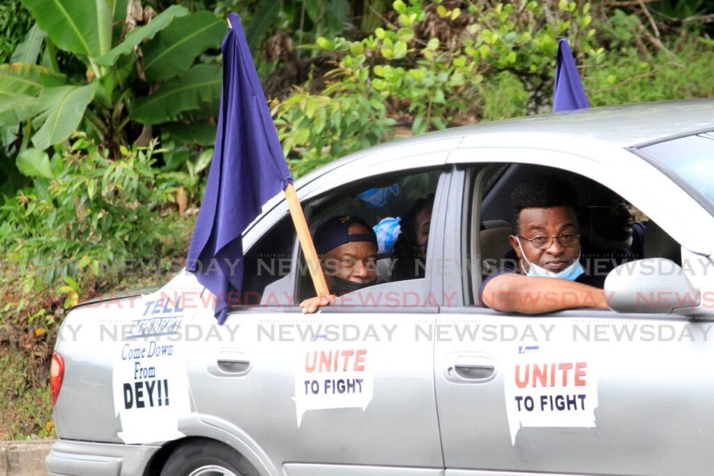 Members of the TT Postal Workers Union were part of the motorcade. Photo by Angelo Marcelle