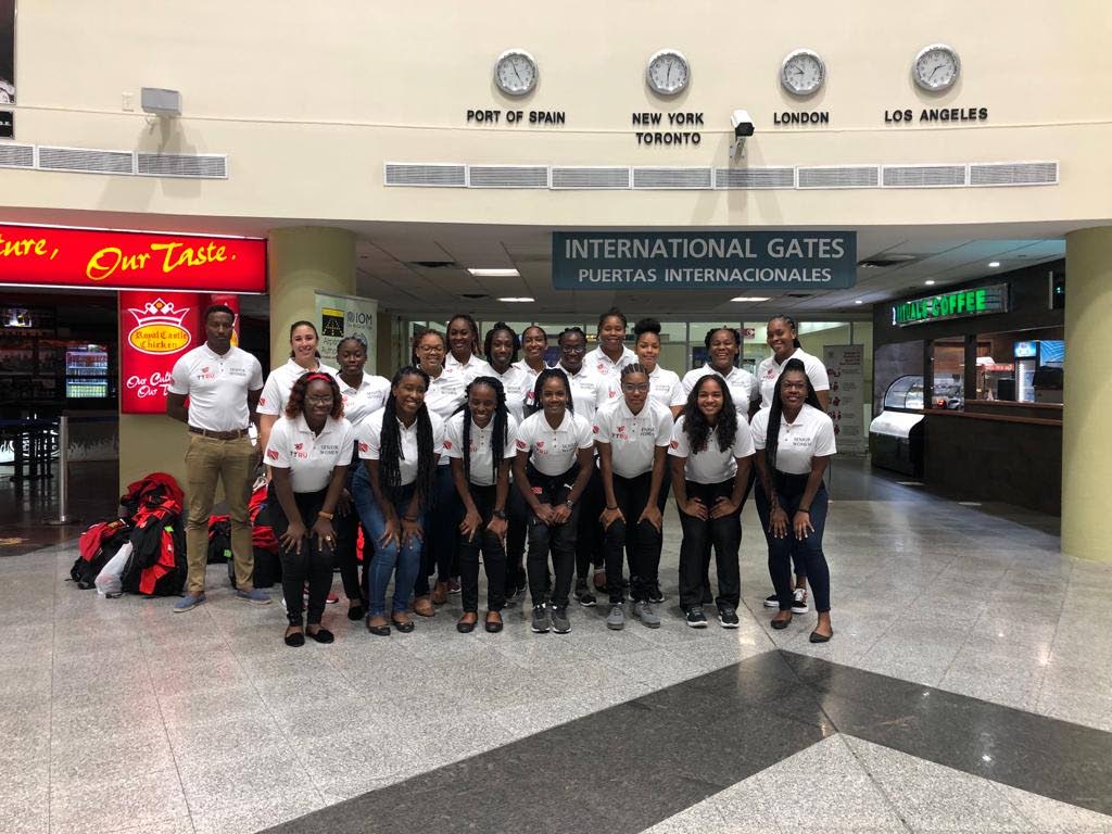 The TT women's rugby team at the Piarco International Airport on Monday before leaving for the 2022 Rugby Americas North tournament in Jamaica. 