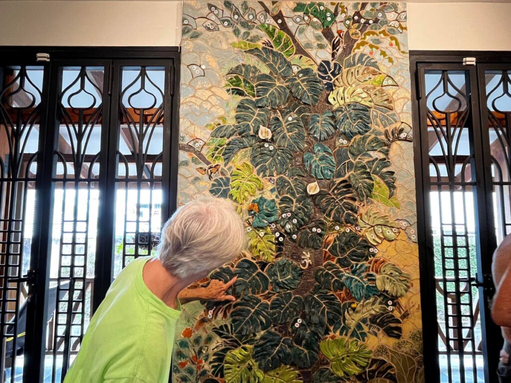 Artist Bunty O'Connor developed a technique to use clay instead of tiles or pieces of glass for the mosaic mural at Cocobel. - 