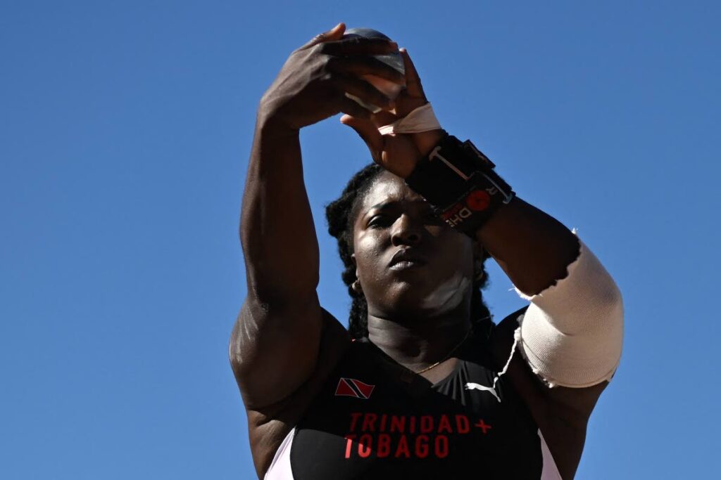 Trinidad and Tobago's Portious Warren competes in the women's shot put qualification during the World Athletics Championships at Hayward Field in Eugene, Oregon on Friday. (AFP PHOTO) - 