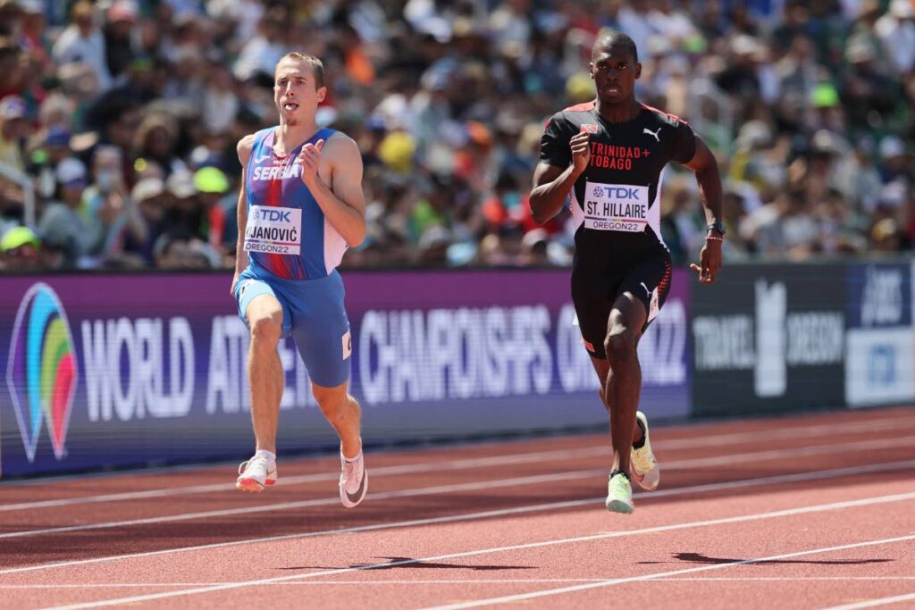 Serbia's Bosko Kijanovic and Trinidad and Tobago's Dwight St. Hillaire compete in the Men's 400m heats on day three of the World Athletics Championships Oregon22 at Hayward Field on July 17, 2022 in Eugene, Oregon. - World Athletics
