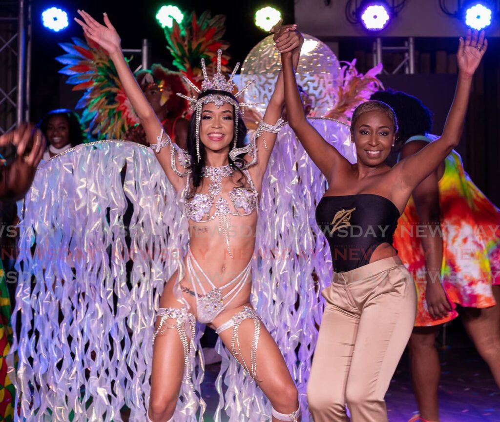 Mas designer Sabrina Seurio with one of the models at the launch of Zain Carnival’s 2022 presentation Treasures of Speyside, at the Mt Irvine Resort on Friday. - David Reid
