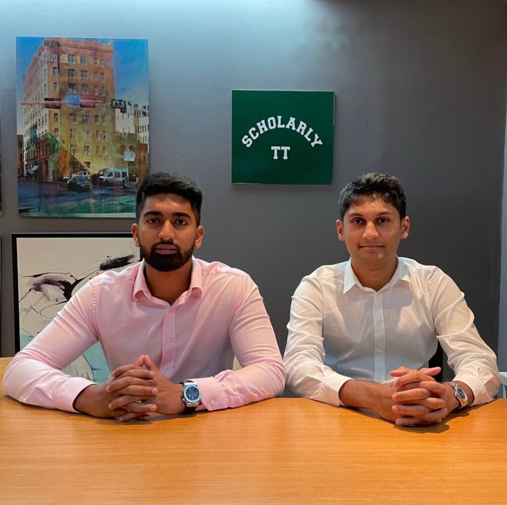 Scholarly TT co-founders Ameer Singh, left, and Ethan Mohammed at the company's Marabella drop-off/pick-up office.  - 