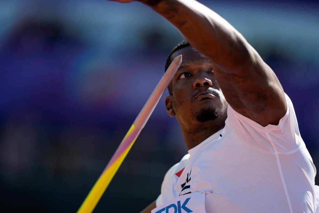 Keshorn Walcott, of Trinidad and Tobago, competes in qualifications for the men's javelin throw at the World Athletics Championships on Thursday, in Eugene, Oregon. - 