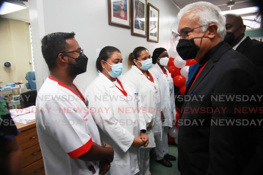 Minister of Health Terrence Deyalsingh greets nurses on Friday at the Blood Bank at the San Fernando General Hospital during the launch of the true voluntary blood donation campaign at the SWRHA. - Lincoln Holder