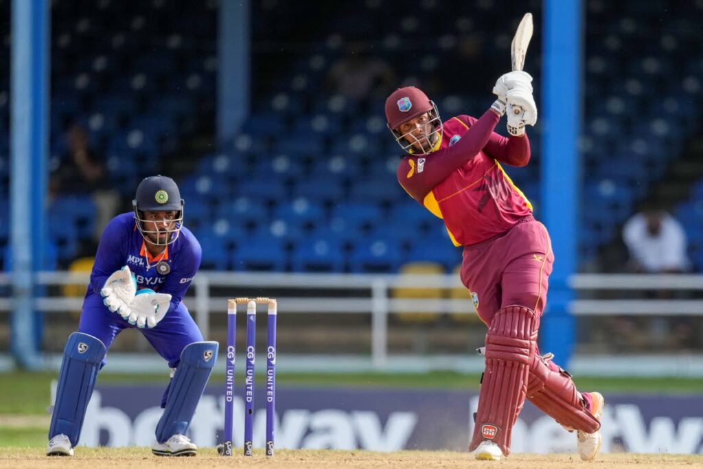 West Indies' Brandon King hits a six from a delivery of India's Axar Patel during the first ODI at the Queen's Park Oval in St Clair, on Friday. (AP PHOTOS) - 
