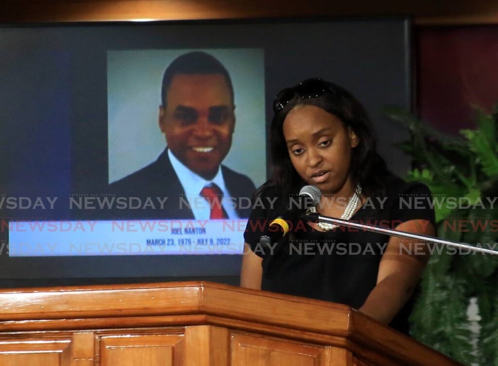 Joanne Durrett delivers the eulogy at her brother's funeral service at Jesus Elam Rivival Assembly International , Prizgar Road, San Juan on July 23. - Sureash Cholai