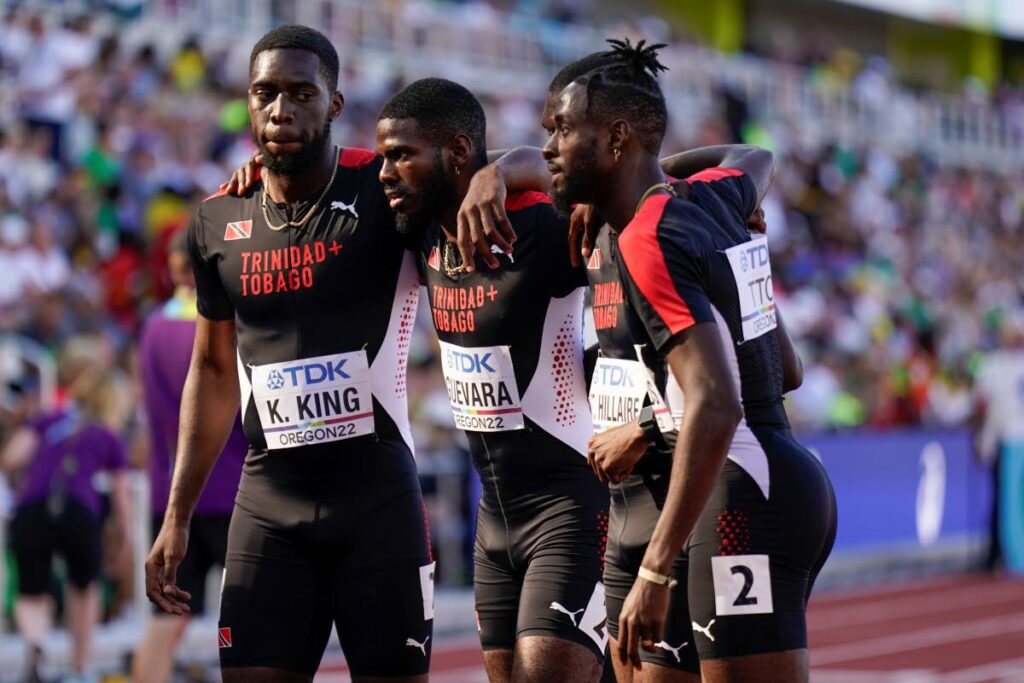 Team Trinidad and Tobago poses on the track after a heat during the men's 4x400-metre relay at the World Athletics Championships on Saturday, in Eugene, Oregon, US. (AP PHOTO) - 
