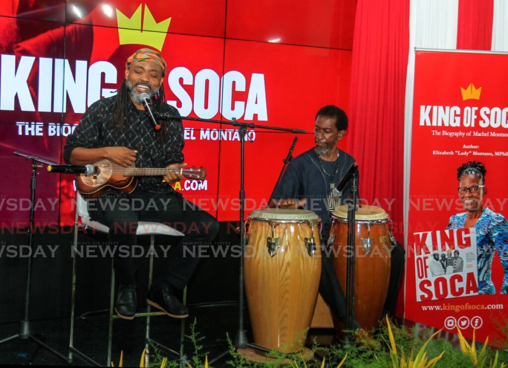 Machel Montano performs a medley of songs accompanied by Tamba Gwindi during the book launch of King of Soca, the biography of Machel Montano by Elizabeth 