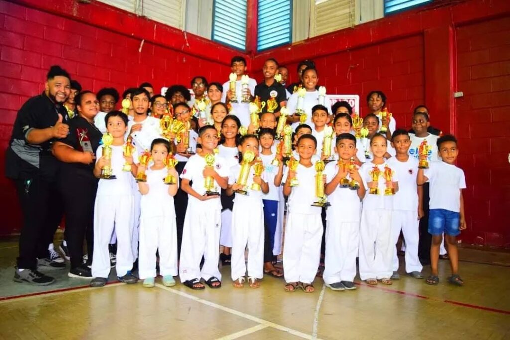 Team Elite Karate show off their awards at the Goshindo Karate Championships held on July 16.  - 