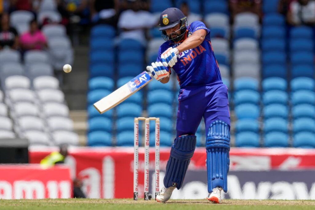 India's captain Rohit Sharma plays a shot against West Indies during the first T20 International at Brian Lara Cricket Academy in Tarouba, on Friday. (AP PHOTOS) 