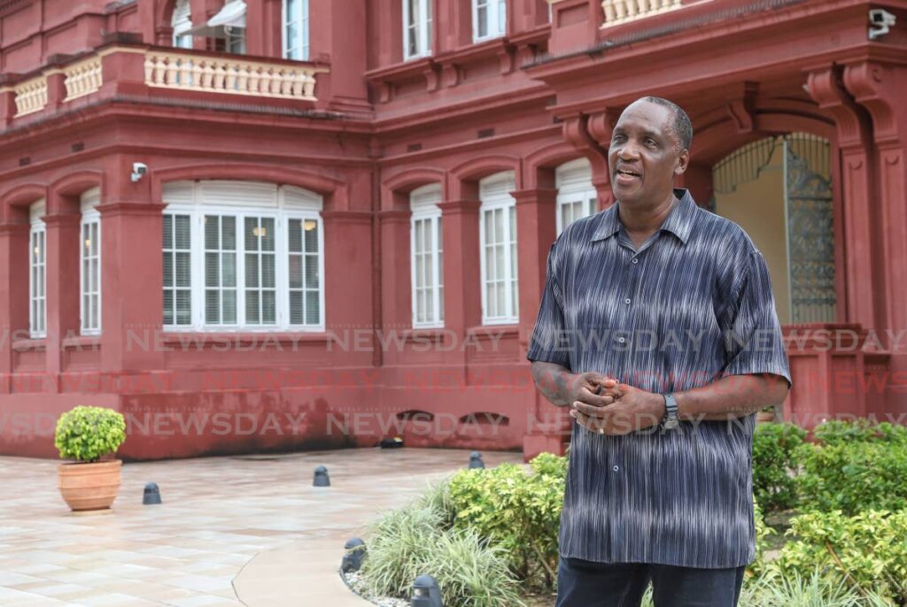Retired Brig General Ancil Antoine outside the Red House, where parliamentarians were held hostage for six days during the 1990 attempted coup. - JEFF K MAYERS
