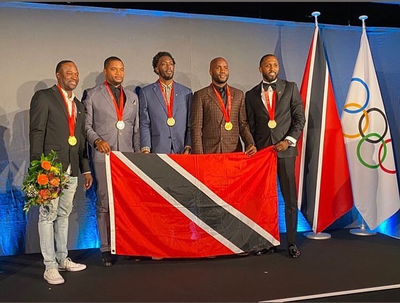 Trinidad and Tobago's men's 2008 4x100 Olympic team collected their gold medals from IOC president Thomas Bach at a reallocation medal ceremony in Switzerland on Tuesday. PHOTO: NAAATT FACEBOOK PAGE 