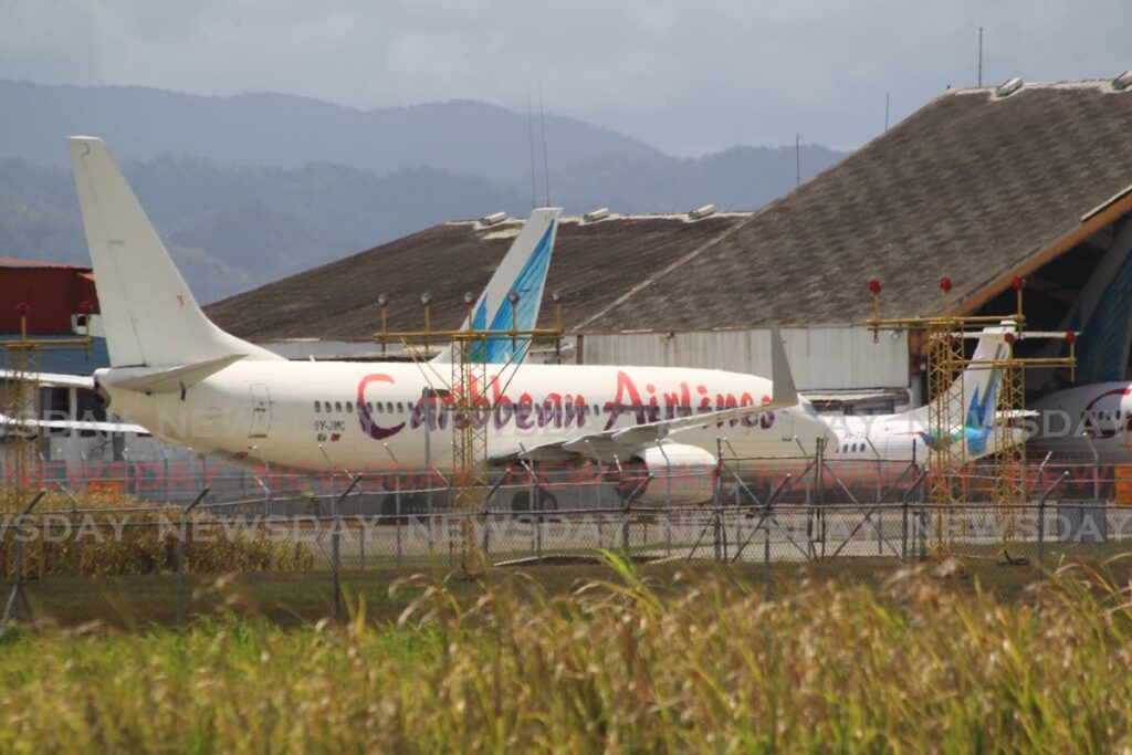 In this May 2020, file photo Caribbean Airlines aircraft are seen parked at the Piarco International Airport.  - ROGER JACOB
