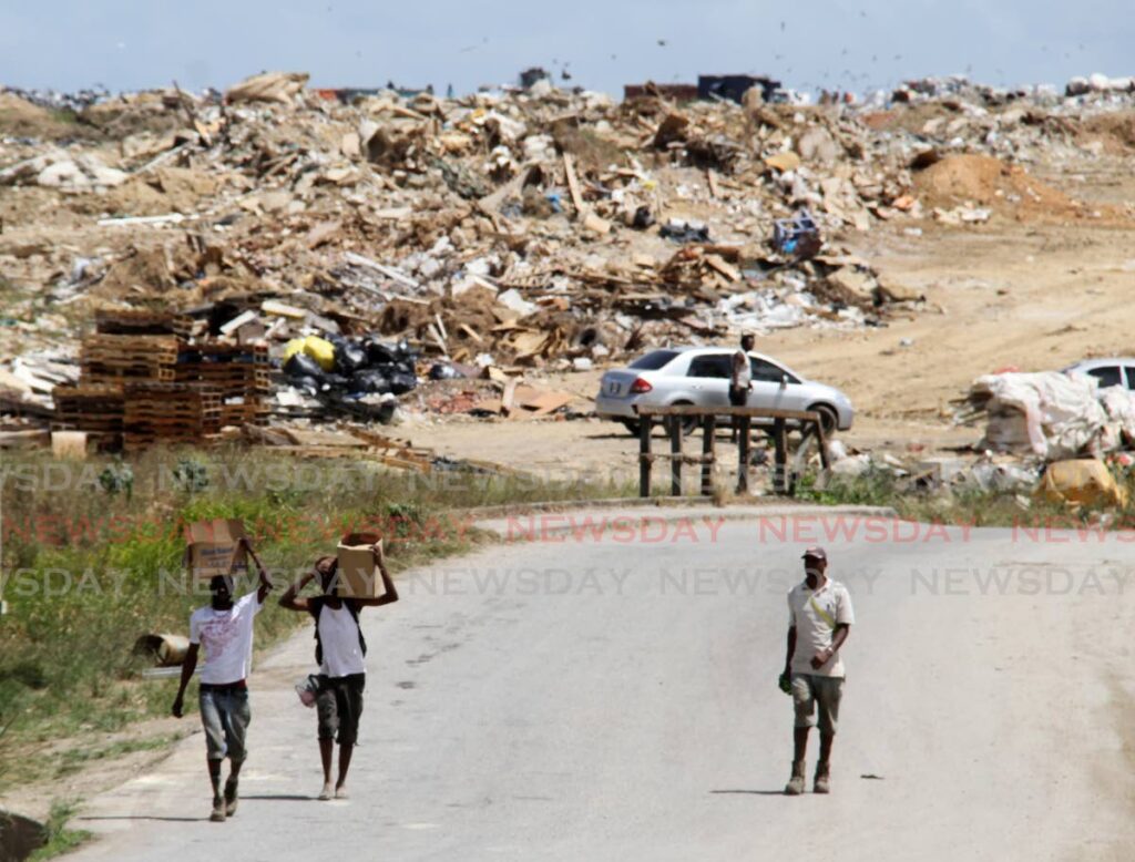 Workers leave the Beetham landfill in April. - File photo/Ayanna Kinsale 