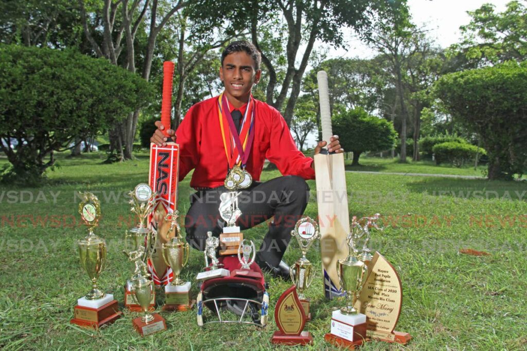 Zane Ethan Maraj with some of the medals and trophies he has won as a cricketer.
 - Marvin Hamilton