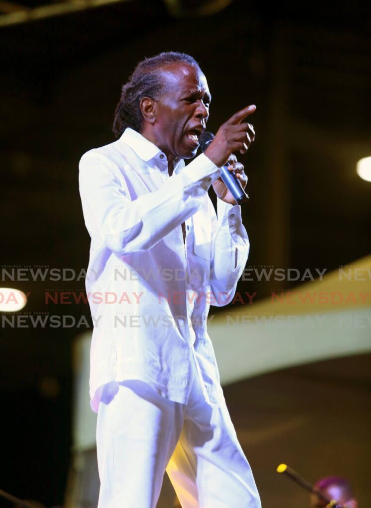 Calypso legend David Rudder in concert at the Lidj Yasu Omowale Emancipation Village at the Queen’s Park Savannah on July 30.  Photo by Sureash Cholai