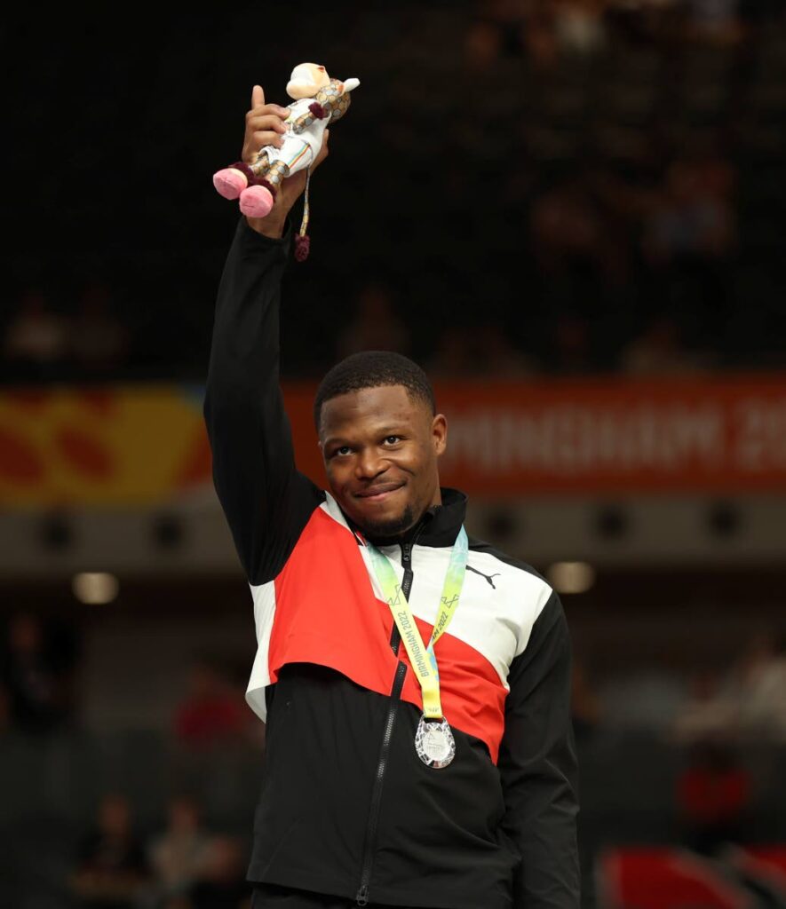 Trinidad and Tobago’s Nicholas Paul celebrates after copping the silver medal for the men’s sprint final during the Commonwealth Games track cycling at Lee Valley VeloPark in London, on Sunday. (AP Photo)