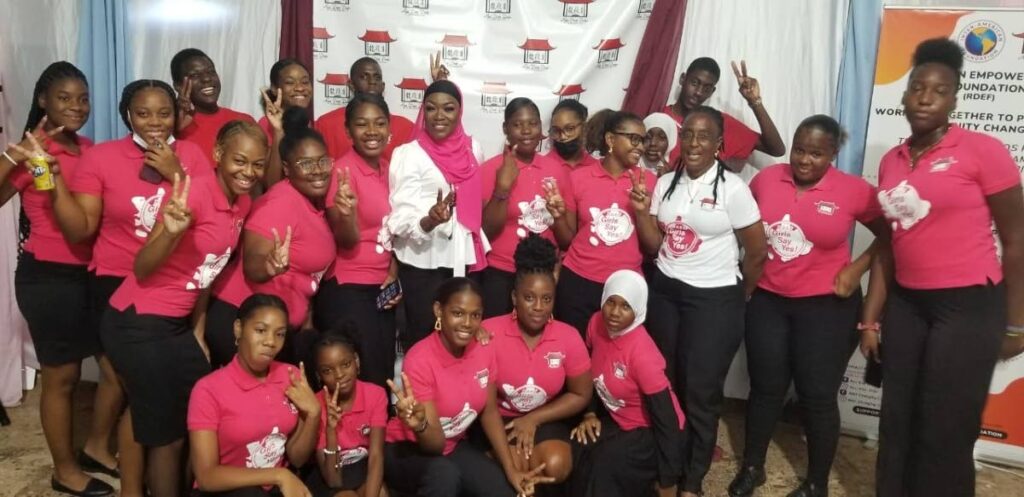 Girls Say Yes participants with members of the Ryu Dan Empowerment Foundation's Young Leaders Team at the launch of the foundation's peace initiative on July 24 at its resource centre in Enterprise. PHOTO COURTESY RYU DAN EMPOWERMENT FOUNDATION - 