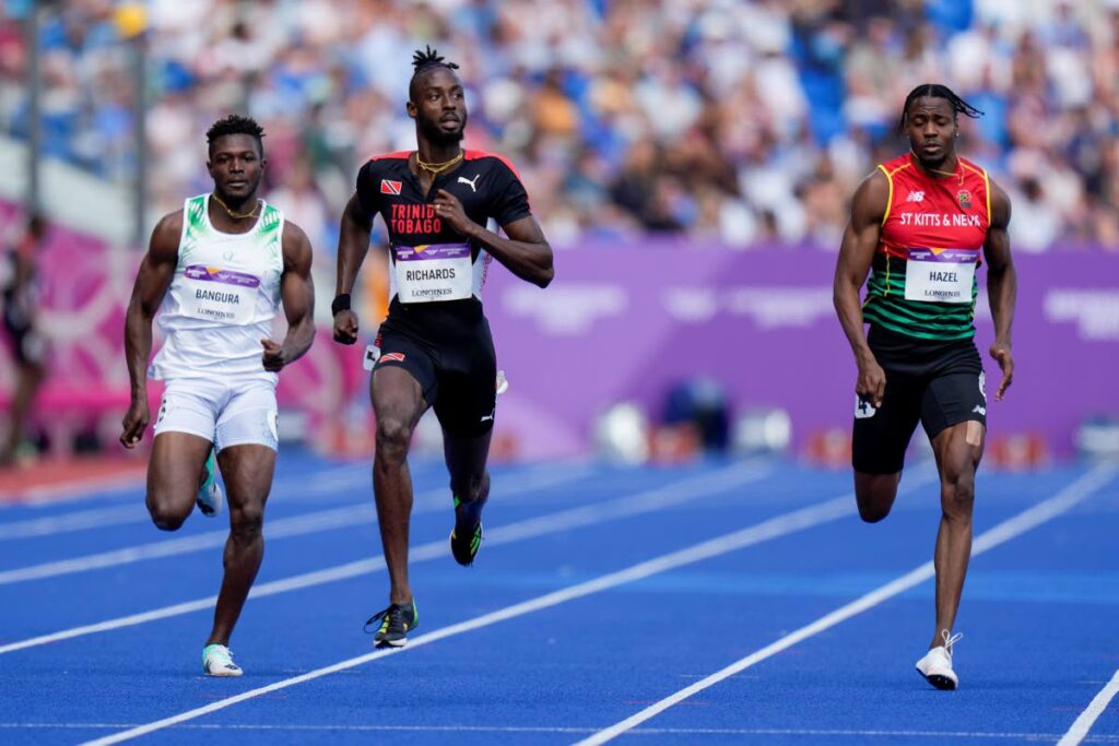 Jereem Richards of Trinidad and Tobago races in his heat of the men's 200m during the athletics in the Alexander Stadium at the Commonwealth Games in Birmingham, England, on Thursday. (AP Photo) 