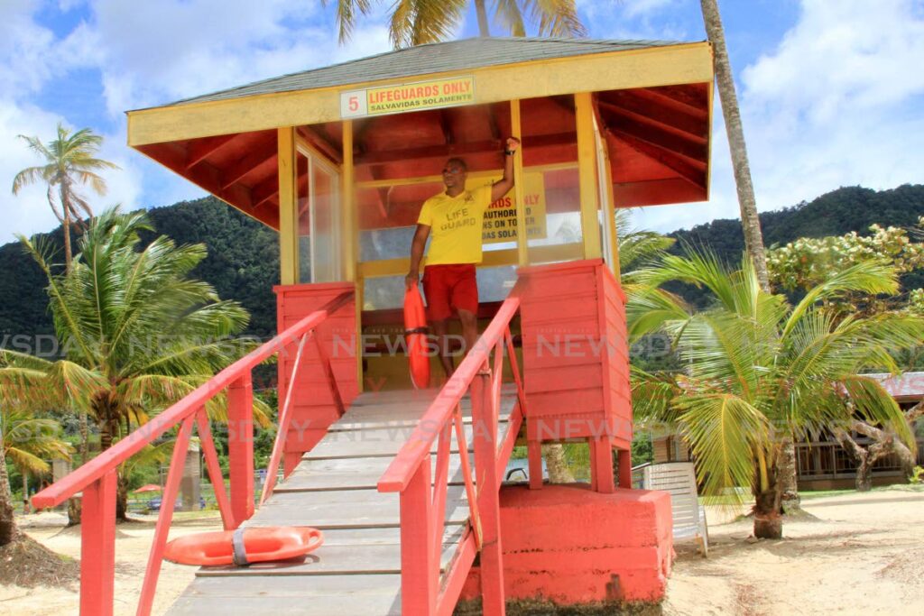 File Photo: A Maracas Bay lifeguard looks out from a tower. - Angelo Marcelle