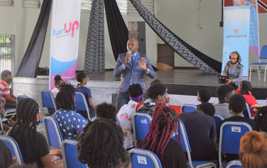 Radio announcer Richard Trumpet speaks to students at the Minstry of Education's vacation revision programme at the Success Laventille Secondary School. Photo courtesy the Minsitry of Education 