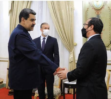 Venezuelan president Nicolas Maduro greets Energy Minister Stuart Young in Caracas on Friday. - Photo courtesy Ministry of Energy and Energy Industries