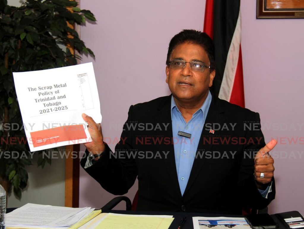 Oropouche MP Dr Roodal Moonilal refers to a 2013 scrap-metal policy, prepared by the Ministry of Trade, at the Opposition UNC media conference on Sunday at the Office of the Leader of the Opposition, Charles Street, Port of Spain. Photo by Ayanna Kinsale 