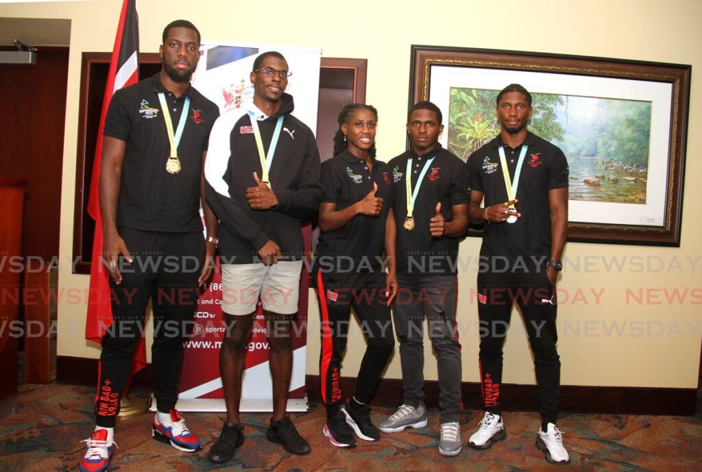 Commonwealth athletes, from left, Kashief King, Dwight St Hillaire, Mauricia Prieto, Che Lara, and Jerod Elcock at the VIP Room, Piarco International Airport, Thursday. - AYANNA KINSALE