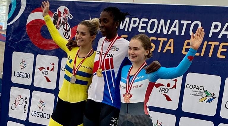 TT cyclist Teniel Campbell, middle, on the podium after winning gold in the women's points race at the 2022 Elite Pan American Track Cycling Championships in Lima, Peru, on Sunday. Barbadian cyclist Amber Joseph, left, earned silver and Canadian Sarah Van Dam grabbed bronze. - 