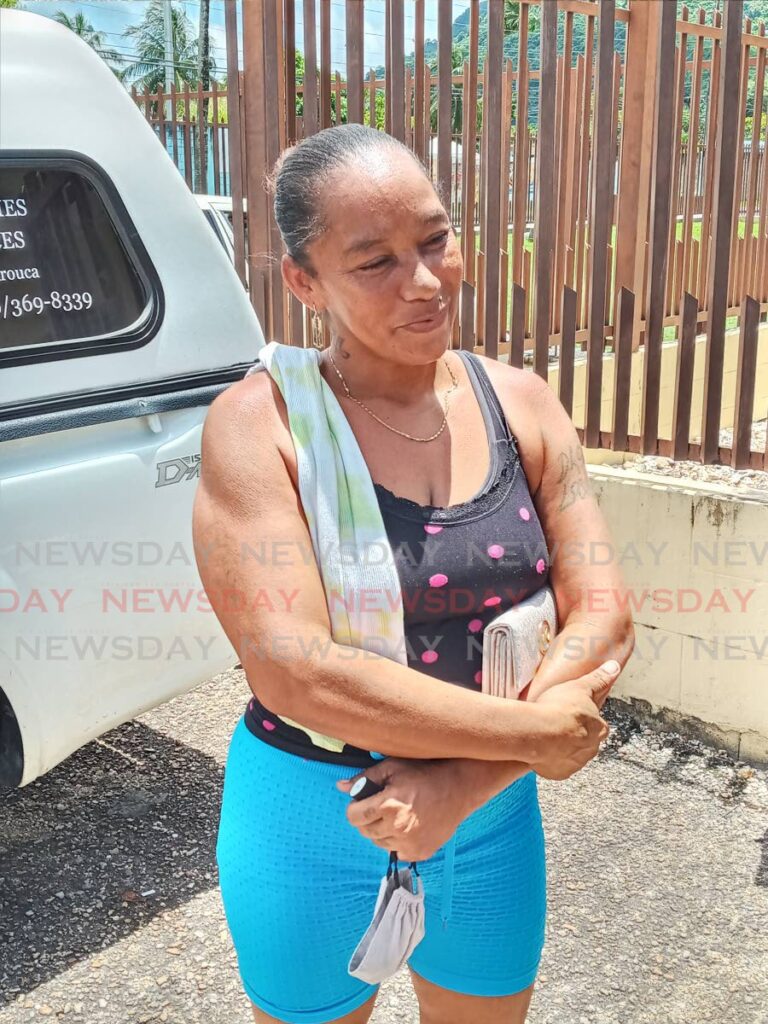 Jenelle Dominique, mother of Carlon Sooknanan, speaks with Newday at the Forensic Science Centre on Monday. Photo by Angelo Marcelle