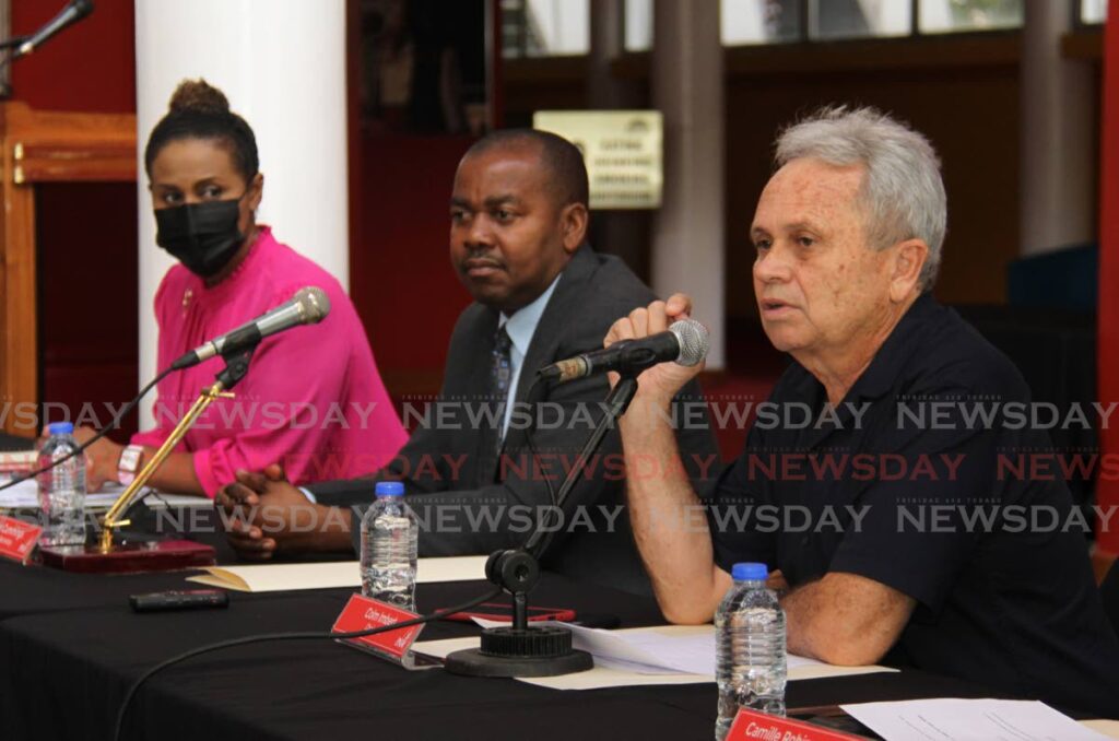 PNM chairman Colm Imbert speaks during the PNM media conference at Queen's Hall, St. Ann's. Also in the photo are public relations office Laurel Lezama-Lee Sing and general secretary Foster Cummings.  - AYANNA KINSALE