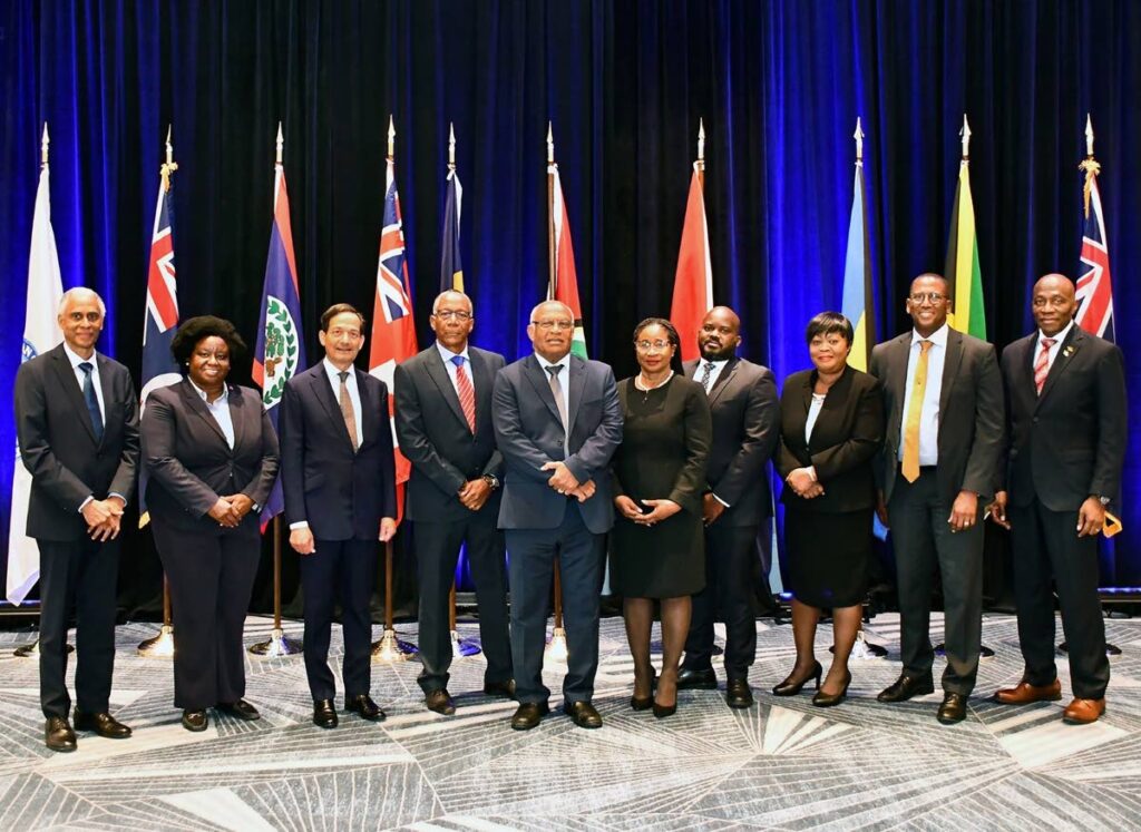 The regional heads of judiciaries attending the conference of chief justices and heads of judiciaries in the Cayman Islands, July 28-29, are, from left, President Adrian Saunders, the Caribbean Court of Justice (CCJ); Chief Justice Michelle Arana, Belize; Chief Justice Narinder Hargun, Bermuda; Chief Justice Sir Patterson Cheltenham, Barbados; Chief Justice Sir Anthony Smellie, Cayman Islands; Ag. Chancellor of the Judiciary of Guyana Yonette Cummings-Edwards; Chief Justice Ian Winder, the Bahamas; Chief Justice Mabel Agyemang, the Turks and Caicos Islands; Chief Justice Ivor Archie, Trinidad and Tobago; and Chief Justice Bryan Sykes, Jamaica. PHOTO COURTESY TT JUDICIARY - 