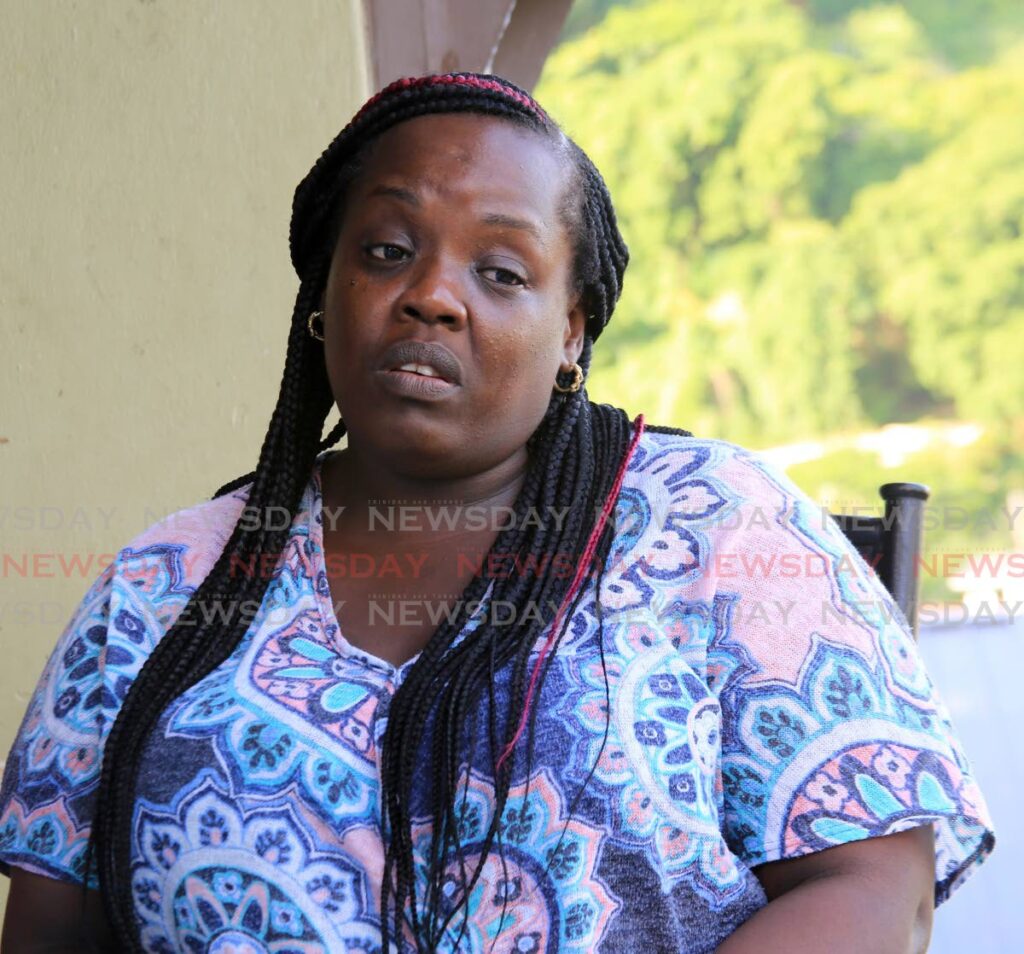A worried Marcia Burke, mother of eight-year-old Javan Price, who is in critical condition at hospital after being shot in the head, speaks with Newsday at her Mon Repos, Morvant, home on Wednesday. - SUREASH CHOLAI