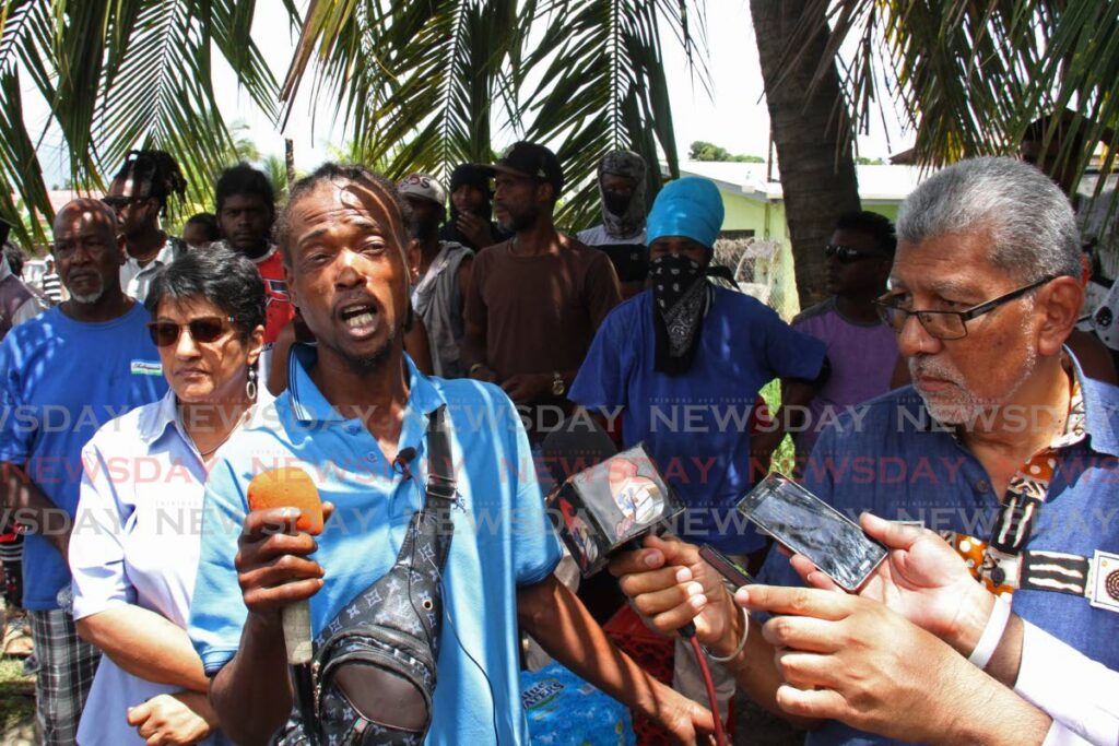 Scrap iron worker, Daniel Joseph,  in an interview on Thursday speaks with media while distancing himself and fellow workers from the Trinidad & Tobago Scrap Iron Dealers Association, blasts the government on the decision to implement a 6-month ban on export to the industry.  Photo by Marvin Hamilton