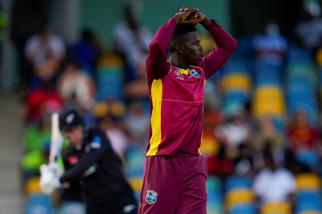 West Indies' Kevin Sinclair gestures while bowling against New Zealand during the second ODI at Kensington Oval in Bridgetown, Barbados, on Friday. - 