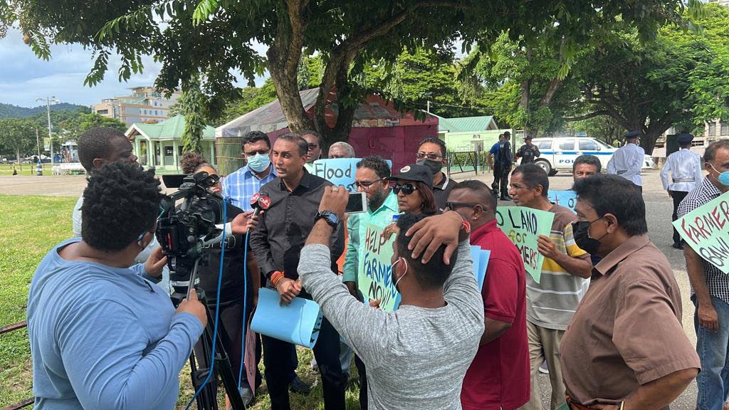 MP for Couva North Ravi Ratiram and Couva farmers protest outside of the agri investment forum and expo at Queen's Park Savannah, Port of Spain on August 19.  - Photo courtesy Ravi Ratiram 