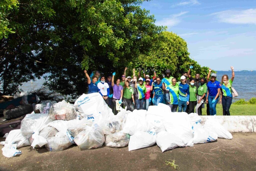 The team of volunteers from Sagicor General Insurance Inc; Sagicor Investments Trinidad and Tobago Limited; the Caribbean Network for Integrated Rural Development (CNIRD); and the Caribbean Youth Environment Network, with 50 bags containing plastic and cans, general waste, and glass.  - 