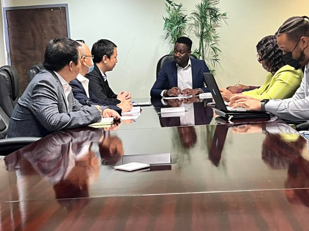 THA Chief Secretary Farley Augustine, centre, at a meeting on Tuesday with China Railway Construction Ltd.  - 
